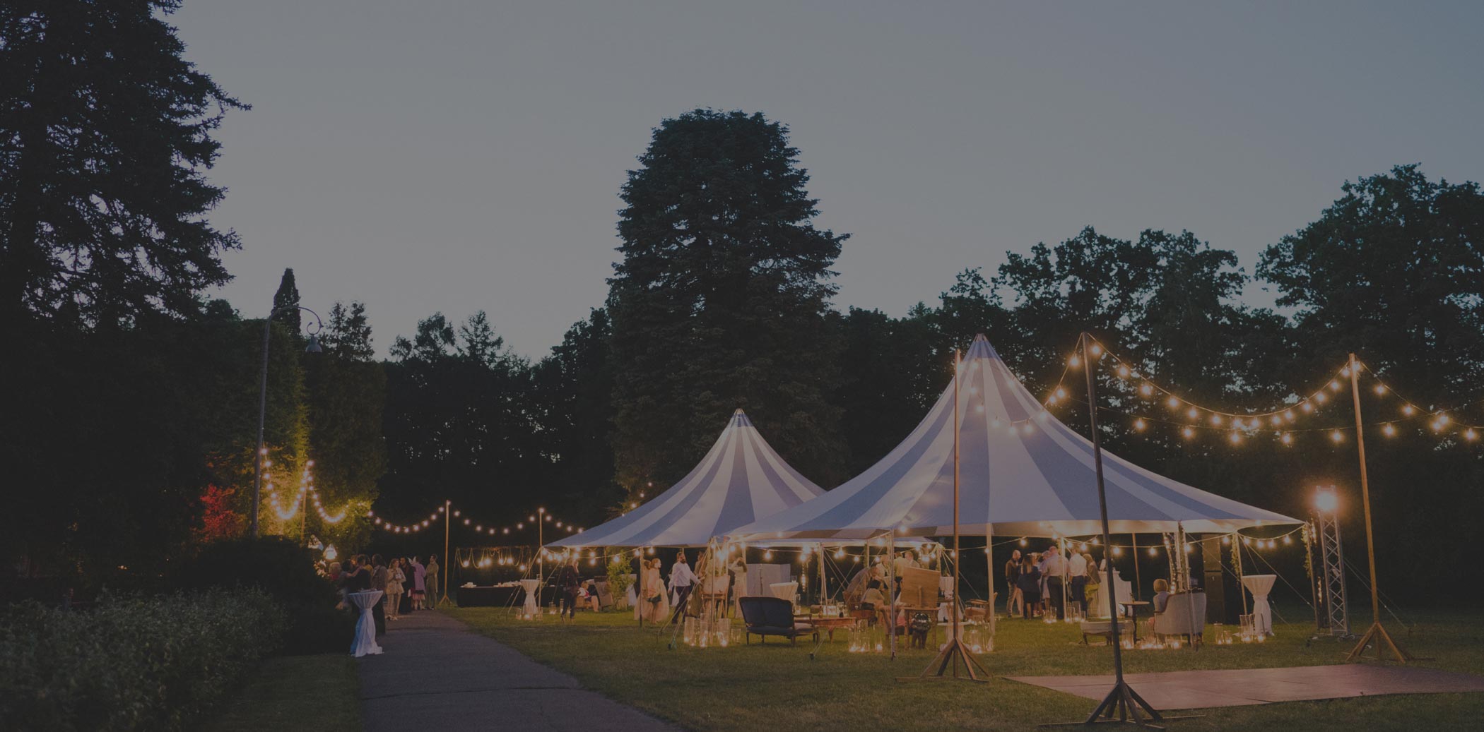 Evening Shot of tents and lights setup for event